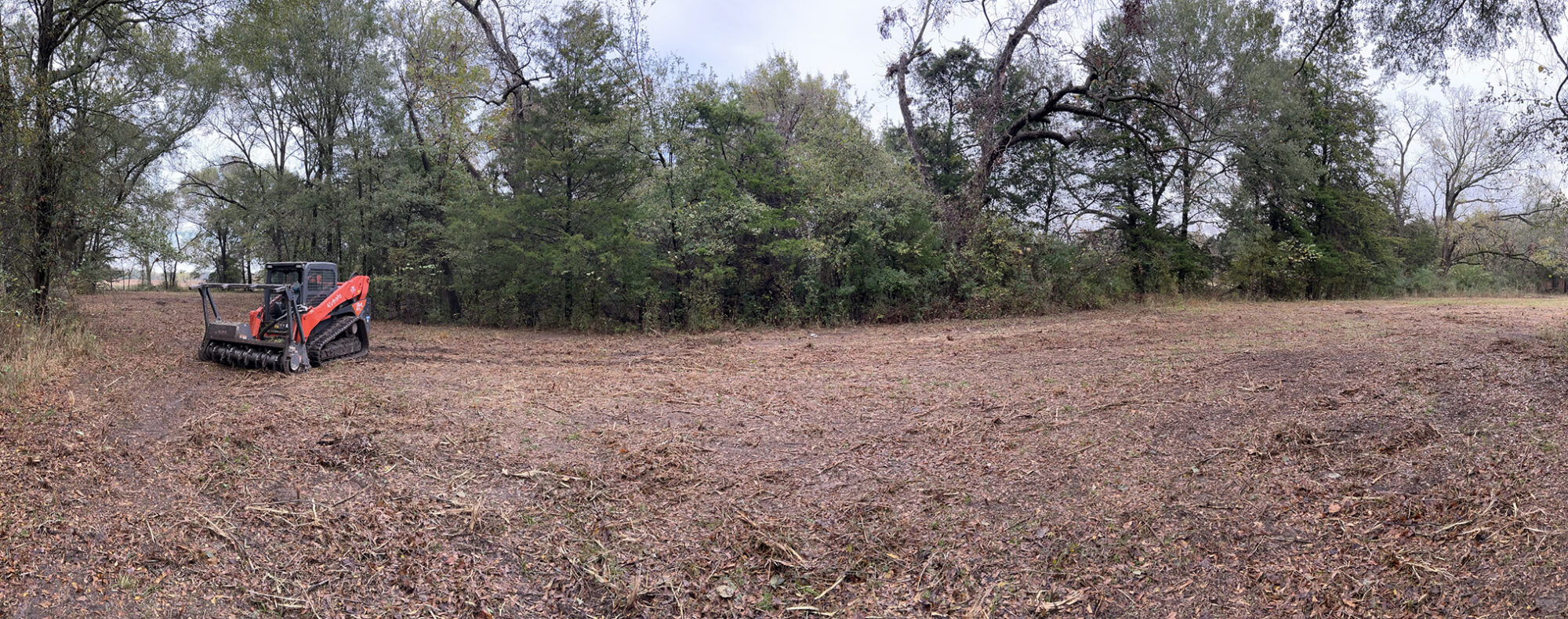 Brush clearing equipment working on a Texas property in winter